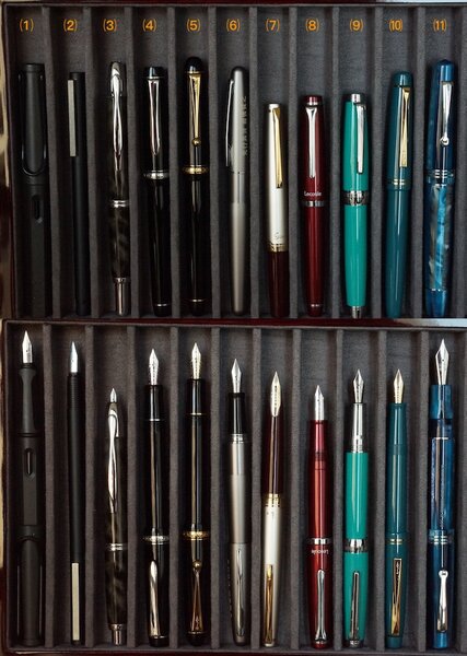 Sailor Lecoule versus ten other pens capped, also with cap posted