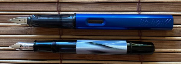 Pelikan M101N Grey Blue - comparison uncapped.jpg